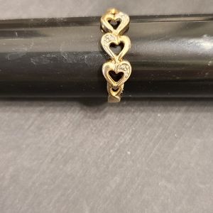 Elegant 10k yellow gold heart ring with diamonds